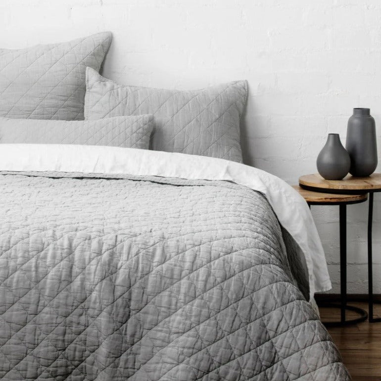The luxurious Soho Quilt is artfully crafted with diamond-stitched quilting for an enduring and chic appearance. Composed of an exceptional mixture of 55% linen and 45% cotton, this collection offers optimal air permeability, resilience, and coziness. Styled.