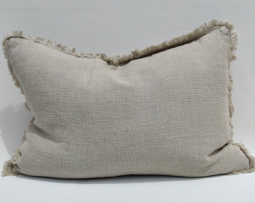 The Avril French Linen Fringed Edge Flax Lumbar Cushion boasts a custom-woven fabric. It is feather filled for a luxuriously comfortable experience and finished with a charming, rustic natural hue.