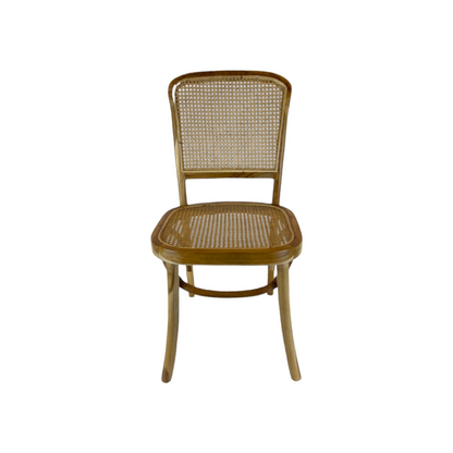 Crafted with high-quality teak wood and rattan, the Kursi Chair has a traditional form that feels warm and welcoming and is also extremely comfortable. Front