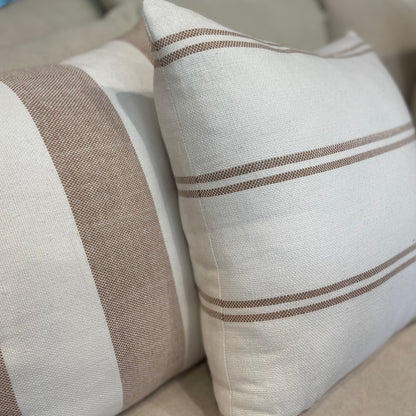 Experience the exquisite craftsmanship of our Kemala Handwoven Cotton Stripe Cushion collection, featuring a delicate striped design handwoven from premium cotton. Its understated color scheme adds a touch of elegance and pairs seamlessly with any home decor.