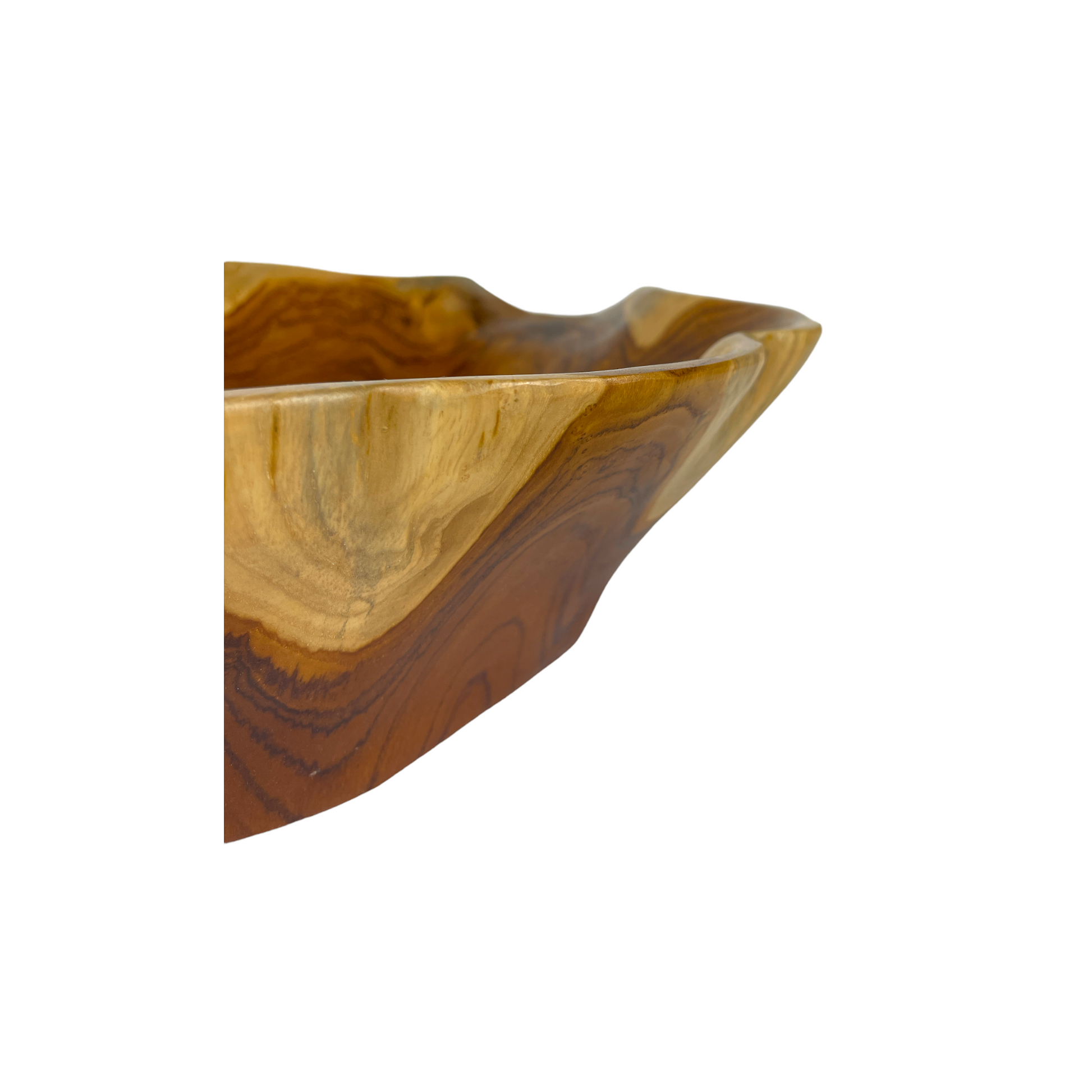 Our Segera Edge Teak Bowl features the best of both organic and airy design. With a warm hue and plenty of natural knots and grains, each bowl is unique, adding a textural look and feel to your home. 