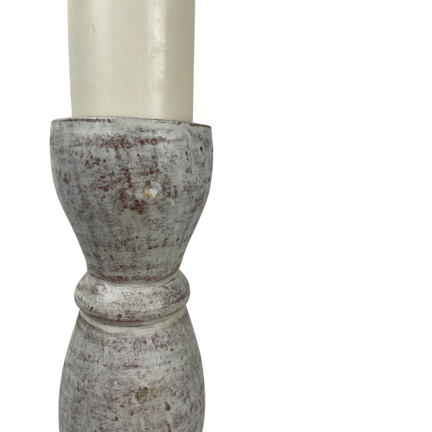 Crafted from terracotta, this chunky yet elegant Poppi Terracotta Candle Holder is substantial enough to work on its own or as a beautiful collection of candle holders on a mantelpiece or a table. Close up.