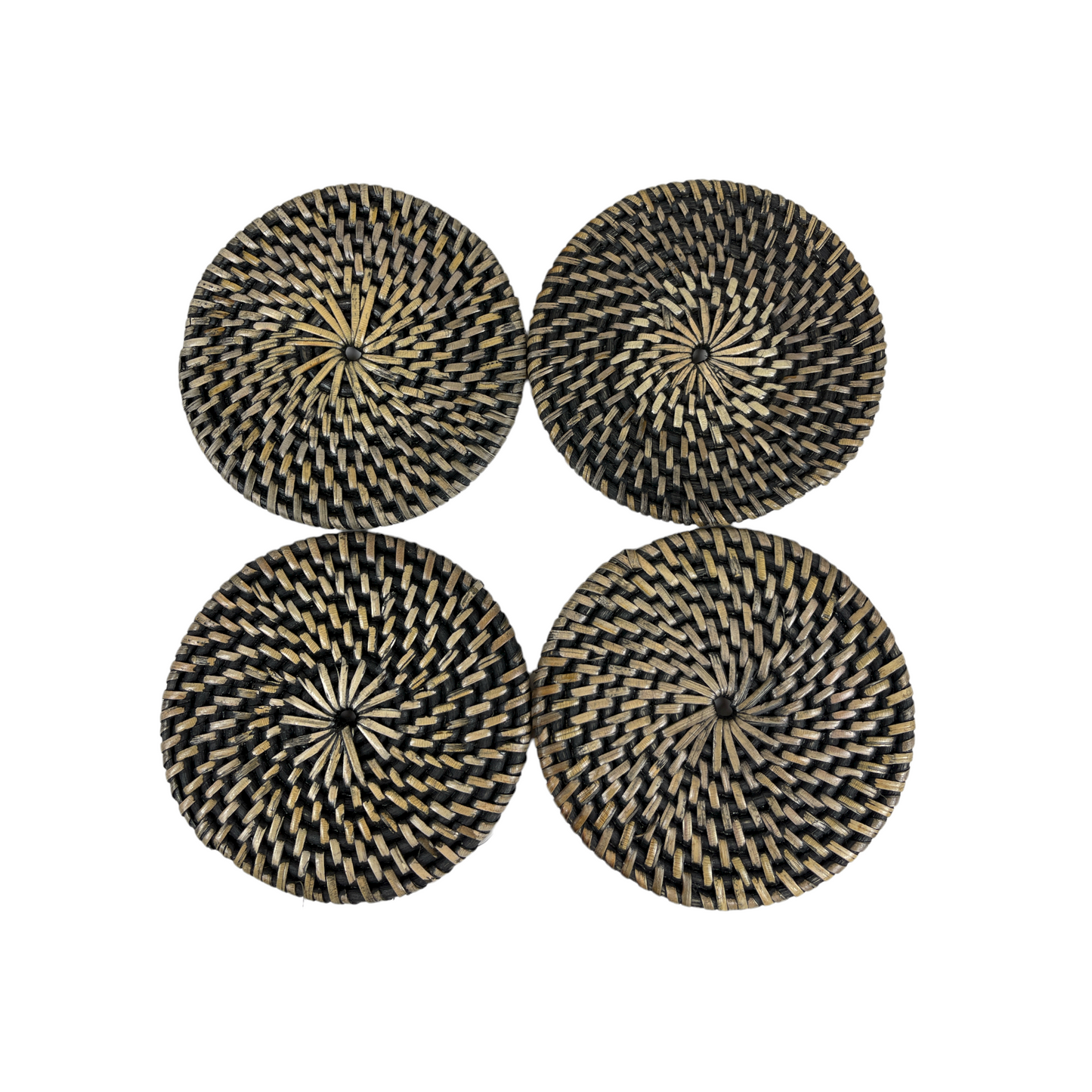 Our Handwoven Putih Rattan Round Coaster - Set of 4 offer a great way to both decorate and protect your table.