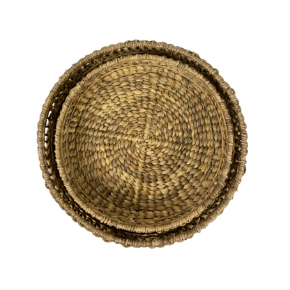 Inspired by the delicate structure of water hyacinth, the Kirana Water Hyacinth Woven Bowl has a wide weave that is relaxed and organic to suit a range of styles and homes. Top view.