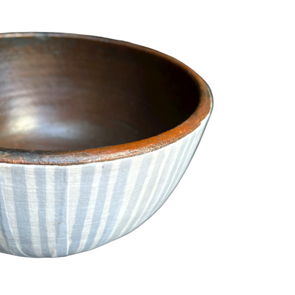 Artfully crafted, the unique Handcrafted Langit Batik & Terracotta Striped Blue Bowl lends just the right amount of texture and dimension to your table. Formed from terracotta, the warm reddish-brown terracotta hues and beautiful natural grains perfectly pair with the playful handcrafted blue Batik pattern.