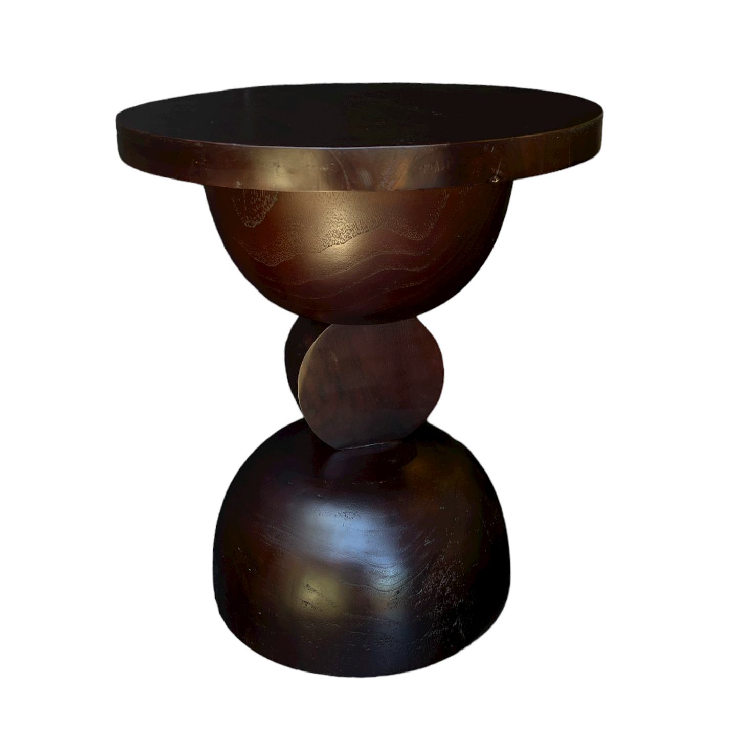 The attractive Mila Side Table is rich with character and interest. Crafted from solid teak and finished with a rich, deep finish, its soft curvaceous shape makes it as practical as it is eye-catching. Front