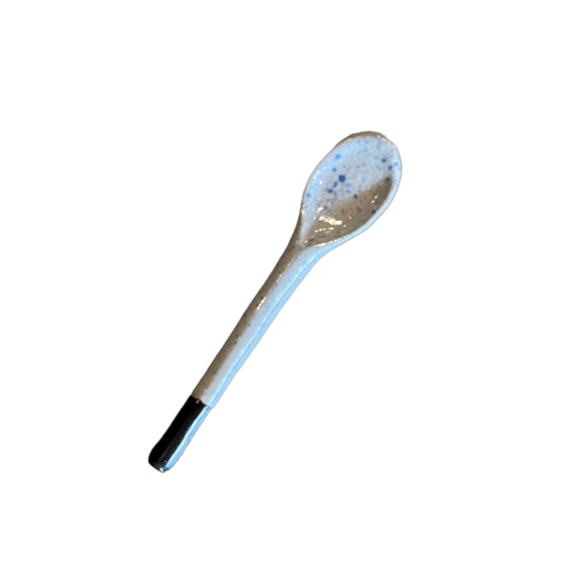 This divine Handcrafted Teman Ceramic Small Spoon will add charm to any table.