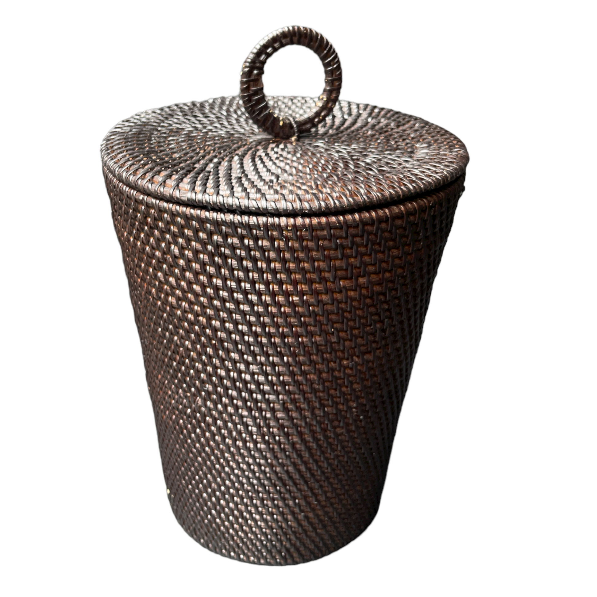 The Dasar Handwoven Rattan Basket's intricate weave adds a touch of organic and casual charm to your home decor. Its lid adds functionality, making it perfect for both styling and storage.