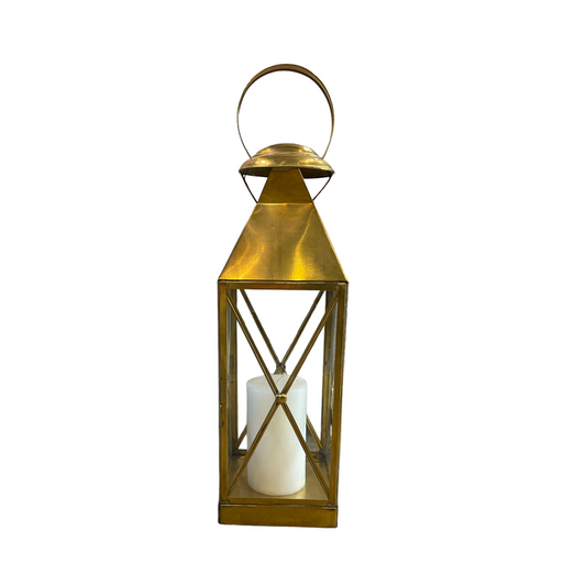 Our beautiful Setiawan Brass & Glass Lantern has been skilfully crafted from highly polished brass and recycled glass. Simply open the small glass door by lifting the neat pin fixing and place a candle inside.