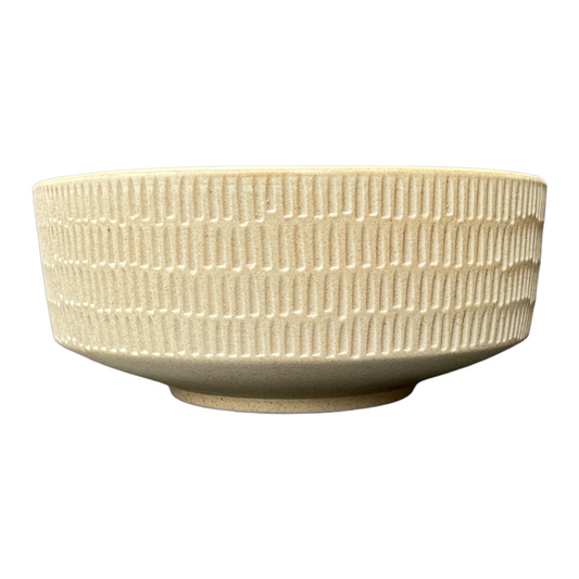 The Tembi Bowl boasts a simple yet contemporary shape and is perfect for adorning your everyday table scape with timeless style.