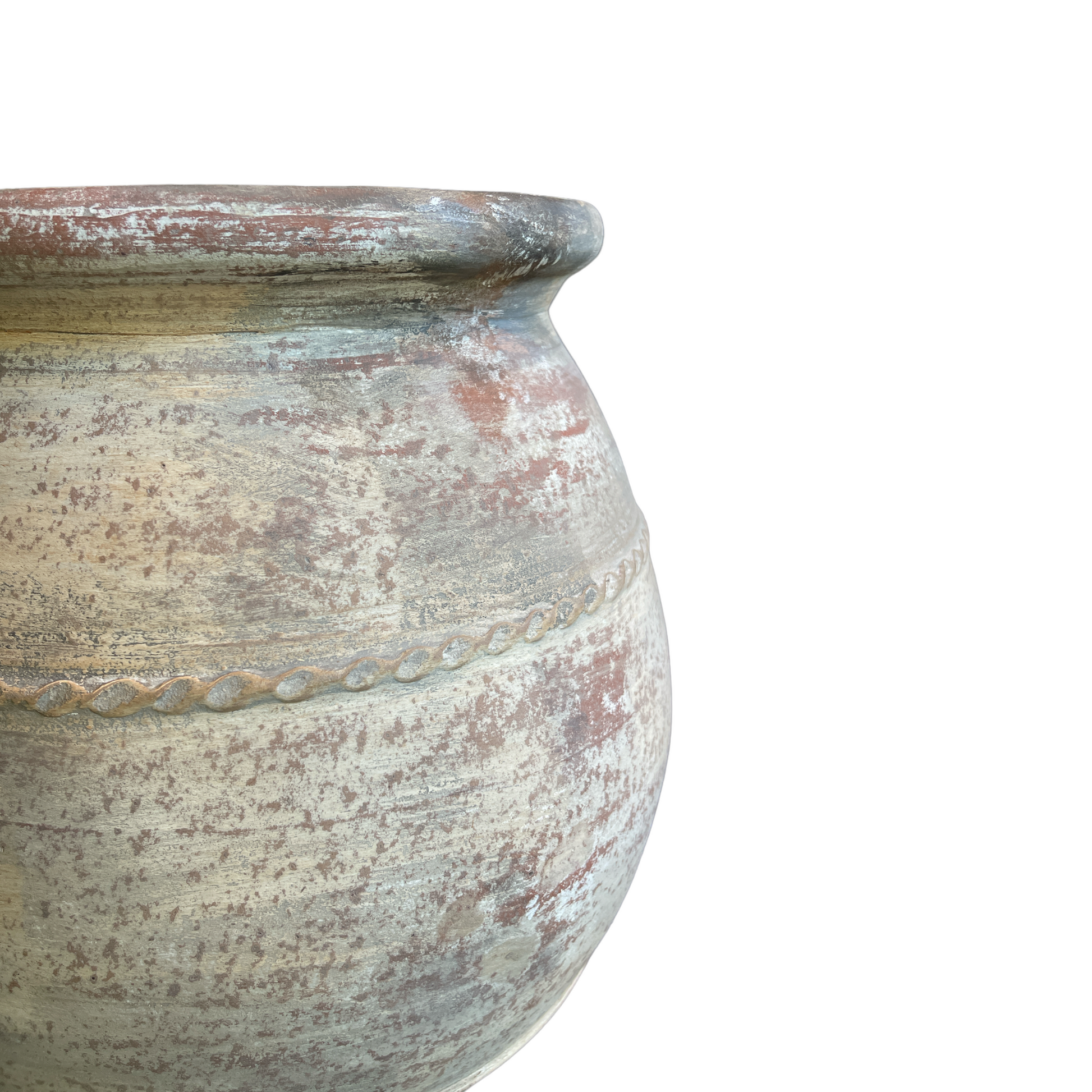 This Terracotta Pot boasts an impressive, aged exterior with attractive limewashed details that complement a variety of styles and spaces. Its generous size is ideal for both greenery and flowers, while the raised texture and rustic colors add a charming touch. Detail.