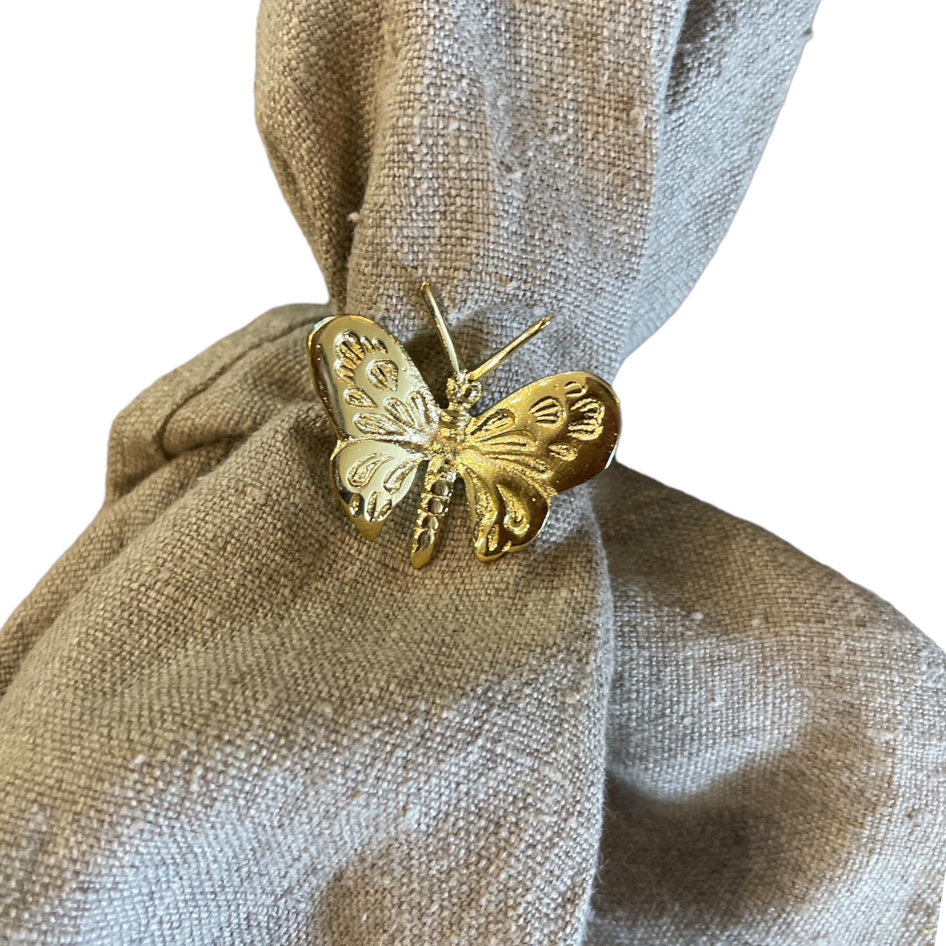 Our charming Brass Butterfly Napkin Ring is the perfect addition to your dining table setting. Front