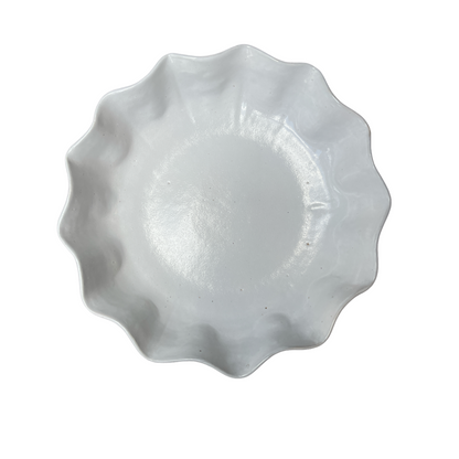 Our Cream Panuta Glzed Bowl is a beautiful handmade piece, with tactile qualities that are evident in its organic shape and distinctive glazed finish. The subtle cream stoneware brings a stylish aesthetic to your tabletop. Top.