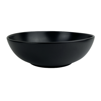 Experience the simplistic elegance of our Handcrafted Black Jenis Bowl, designed with a smooth and gentle edge for a touch of refinement.