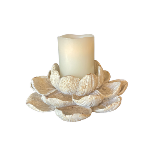 The charming Lotus Flower Stone Candle Holder with its weathered whitewashed finish adds style to any table or sideboard. Styled.