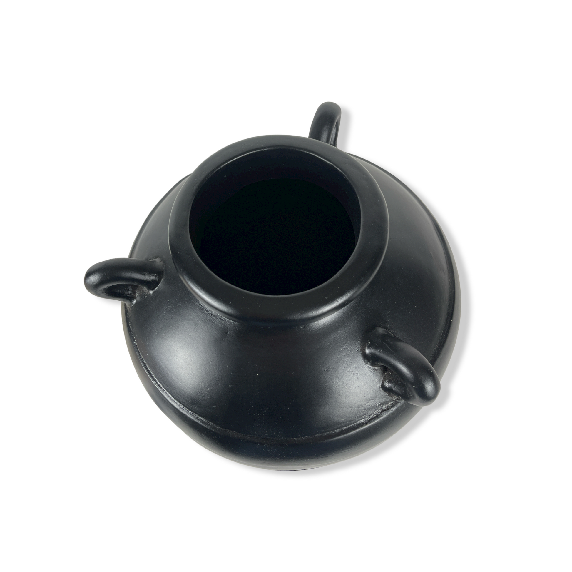 Experience the timeless elegance of the Barjac Pot, with its sleek black hue and classic lines that add depth and character to any home decor. Indulge in the unique style and sophistication this pot brings to your living space. Top.